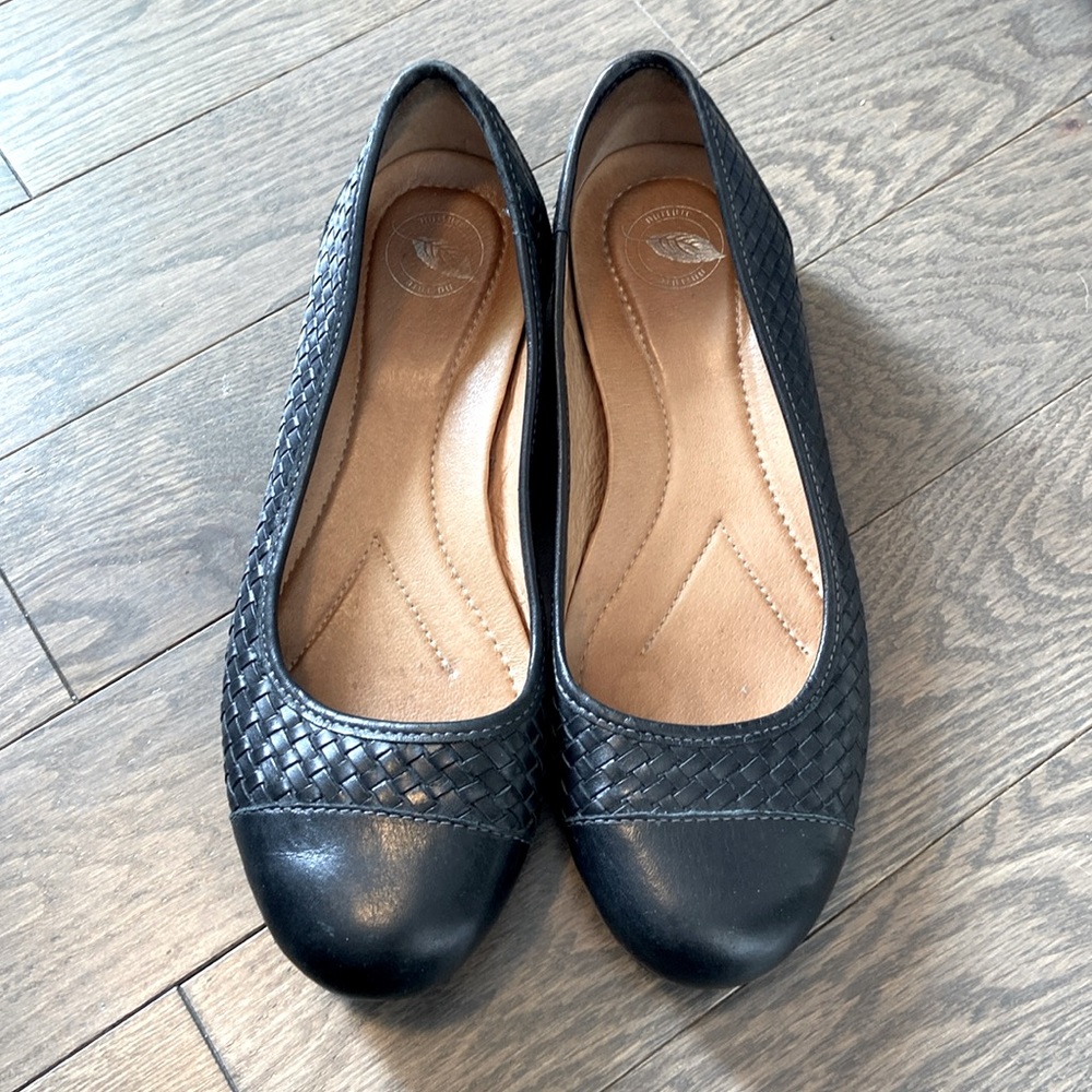 Black leather ballet flats by Nurture